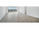 Spacious great room with tile flooring and sliding glass doors at 4235 E Brook Lynn Pl, San Tan Valley, AZ 85143