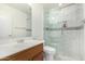 Bathroom boasts a walk-in shower with marble tile and a modern vanity at 441 W San Remo St, Gilbert, AZ 85233