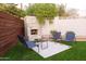 Relaxing backyard oasis with a built-in fire pit and comfortable seating area at 6127 E Mescal St, Scottsdale, AZ 85254
