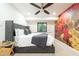 Spacious Primary bedroom with a king-size bed and a large mural on one wall at 6127 E Mescal St, Scottsdale, AZ 85254
