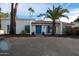 Beautiful mid-century modern home with blue door at 6127 E Mescal St, Scottsdale, AZ 85254