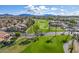 Aerial view of community with golf course and mountain views at 6202 E Mckellips Rd # 117, Mesa, AZ 85215