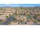 Community overview featuring pool, clubhouse, and surrounding homes at 6202 E Mckellips Rd # 117, Mesa, AZ 85215