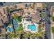 Aerial view showcasing the community pool, clubhouse, and pickleball courts at 6202 E Mckellips Rd # 117, Mesa, AZ 85215