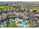 Community pool, pickleball courts, and clubhouse are shown in this aerial view at 6202 E Mckellips Rd # 117, Mesa, AZ 85215