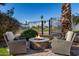 Fire pit and seating area on the patio at 6202 E Mckellips Rd # 117, Mesa, AZ 85215