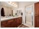 Double vanity bathroom with granite countertop and walk-in shower at 6202 E Mckellips Rd # 117, Mesa, AZ 85215