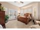 Bright bedroom with double doors leading to patio at 6202 E Mckellips Rd # 117, Mesa, AZ 85215