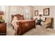 Comfortable bedroom with wood furniture and sitting area at 6202 E Mckellips Rd # 117, Mesa, AZ 85215