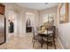 Breakfast nook with a round table and four chairs, near kitchen at 6202 E Mckellips Rd # 117, Mesa, AZ 85215