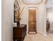 Bright and spacious entryway with wood flooring and a console table at 6202 E Mckellips Rd # 117, Mesa, AZ 85215