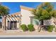 Single-story home with a charming front patio and landscaping at 6202 E Mckellips Rd # 117, Mesa, AZ 85215