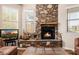 Living room features a large stone fireplace at 6202 E Mckellips Rd # 117, Mesa, AZ 85215