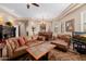 Open living room with leather sofas and a dining area at 6202 E Mckellips Rd # 117, Mesa, AZ 85215