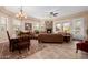 Open and bright living space with dining area and fireplace at 6202 E Mckellips Rd # 117, Mesa, AZ 85215