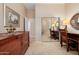 Home office with built-in desk and mirrored closet at 6202 E Mckellips Rd # 117, Mesa, AZ 85215