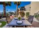 Outdoor dining table set for three at 6202 E Mckellips Rd # 117, Mesa, AZ 85215