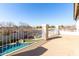 Large patio overlooking backyard pool and landscape at 6422 S 26Th Ln, Phoenix, AZ 85041