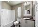 Clean, tidy bathroom with a bath tub, single sink, and toilet at 650 N Hawes Rd # 3510, Mesa, AZ 85207