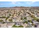 Aerial view showcasing the neighborhood and surrounding mountain views at 6868 W Cottontail Ln, Peoria, AZ 85383