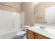 Bathroom with a tub and shower combo, single sink vanity, and a mirror at 743 E Horizon Heights Dr, San Tan Valley, AZ 85143