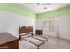 Bright bedroom with green and white walls, carpet, and ceiling fan at 743 E Horizon Heights Dr, San Tan Valley, AZ 85143