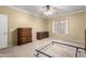 Bedroom highlighting neutral walls, ceiling fan, carpet flooring, and wooden furniture at 743 E Horizon Heights Dr, San Tan Valley, AZ 85143