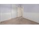 Bedroom with carpet, neutral walls, and a closet with sliding doors at 743 E Horizon Heights Dr, San Tan Valley, AZ 85143