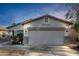Charming single-story home with a two-car garage and low-maintenance landscaping at 743 E Horizon Heights Dr, San Tan Valley, AZ 85143