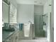 Elegant bathroom with walk-in shower, soaking tub, and updated fixtures at 8227 E Sierra Pinta Dr, Scottsdale, AZ 85255