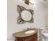 Bathroom with granite vanity and decorative mirror at 8227 E Sierra Pinta Dr, Scottsdale, AZ 85255