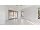 Bright bedroom with sliding glass doors to patio at 8227 E Sierra Pinta Dr, Scottsdale, AZ 85255