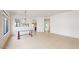 Bright dining room with glass-top table and chandelier at 8227 E Sierra Pinta Dr, Scottsdale, AZ 85255