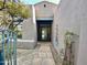 Inviting entryway with a stone pathway and lush landscaping at 8227 E Sierra Pinta Dr, Scottsdale, AZ 85255