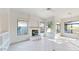 Cozy Gathering room featuring a fireplace and built-in shelving at 8227 E Sierra Pinta Dr, Scottsdale, AZ 85255