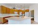 Kitchen boasts an island, double ovens, and ample cabinetry at 8227 E Sierra Pinta Dr, Scottsdale, AZ 85255