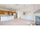 Kitchen with island, wood cabinets, and stainless steel appliances at 8227 E Sierra Pinta Dr, Scottsdale, AZ 85255