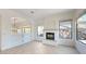 Living room with fireplace and built-in shelving at 8227 E Sierra Pinta Dr, Scottsdale, AZ 85255