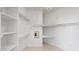 Large walk-in closet with ample shelving and hanging space at 8227 E Sierra Pinta Dr, Scottsdale, AZ 85255