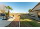 Spacious backyard with pool, patio, and sports court at 8642 W Harmony Ln, Peoria, AZ 85382