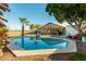 Octagon pool with patio furniture and a basketball hoop at 8642 W Harmony Ln, Peoria, AZ 85382