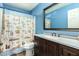 Clean bathroom with updated vanity and shower/tub combo at 8642 W Harmony Ln, Peoria, AZ 85382