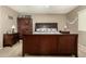 Primary bedroom with dark wood furniture and ceiling fan at 8642 W Harmony Ln, Peoria, AZ 85382