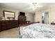 Primary bedroom with ample closet space and dresser at 8642 W Harmony Ln, Peoria, AZ 85382