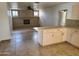 Living room with tile floor and brick fireplace at 887 E Detroit St, Chandler, AZ 85225