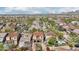 Bird's eye perspective of a community highlighting the varying architectural styles and serene pools at 9305 E Canyon View Rd, Scottsdale, AZ 85255
