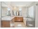 This primary bath has a stand up shower, soaking tub, and dual vanity at 9305 E Canyon View Rd, Scottsdale, AZ 85255