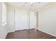 This bedroom has a ceiling fan and closet with folding doors at 9305 E Canyon View Rd, Scottsdale, AZ 85255