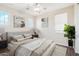 Neutral primary bedroom with natural light, decorative accents, ceiling fan, and soft textures at 9305 E Canyon View Rd, Scottsdale, AZ 85255