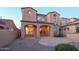 Charming two-story house with a tile roof, stucco exterior, and covered patio area at 9305 E Canyon View Rd, Scottsdale, AZ 85255